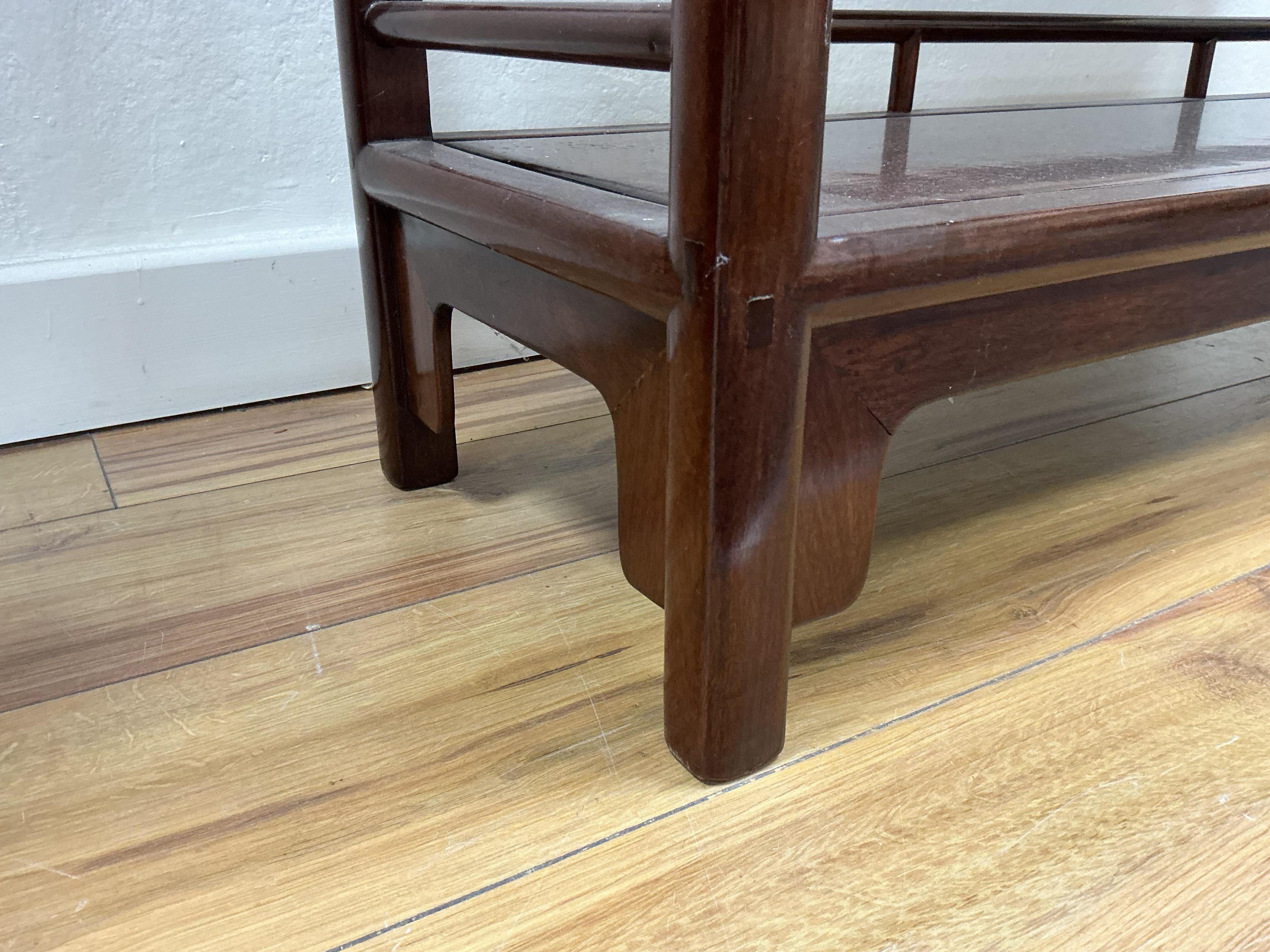 A Chinese hardwood open bookcase, width 100cm, depth 30cm, height 195cm